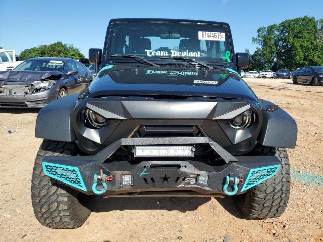 1C4BJWDGXGL139397 - 2016 JEEP WRANGLER U SPORT BLACK photo 5