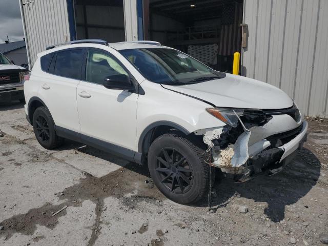 JTMZFREV0HJ700086 - 2017 TOYOTA RAV4 LE WHITE photo 4
