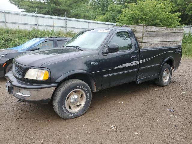 1FTDF18WXVLB29187 - 1997 FORD F150 BLACK photo 1