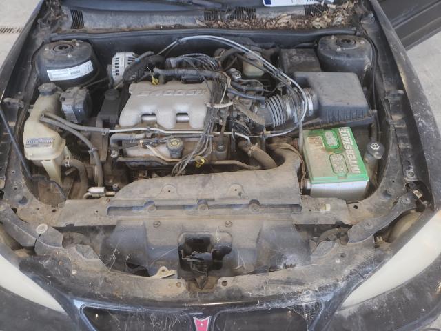 1G2NV12E02C218340 - 2002 PONTIAC GRAND AM GT1 BLACK photo 7