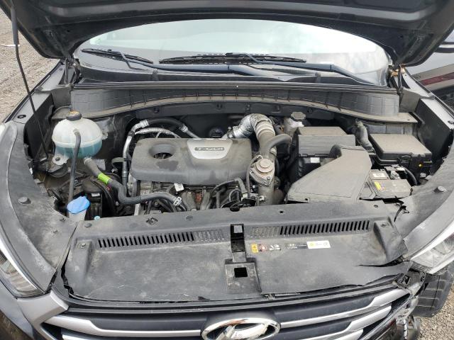 KM8J3CA26JU736752 - 2018 HYUNDAI TUCSON VALUE BLACK photo 11