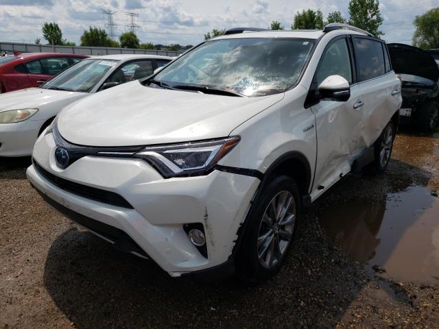 JTMDJREV9JD254789 - 2018 TOYOTA RAV4 HV LIMITED WHITE photo 1