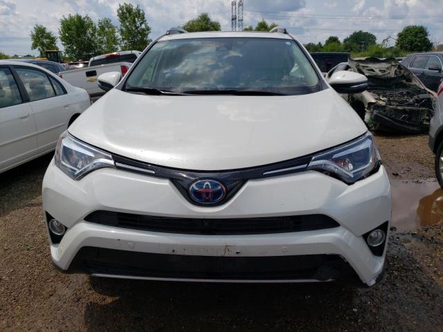 JTMDJREV9JD254789 - 2018 TOYOTA RAV4 HV LIMITED WHITE photo 5