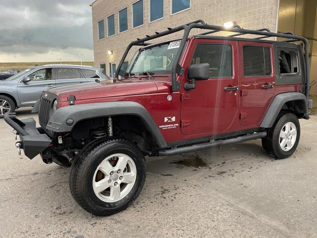 1J4GA39179L790881 - 2009 JEEP WRANGLER U X MAROON photo 1