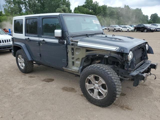 1C4HJWEG8HL640282 - 2017 JEEP WRANGLER U SAHARA GRAY photo 4