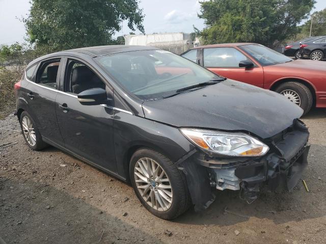 1FAHP3M28CL393041 - 2012 FORD FOCUS SEL BLACK photo 4