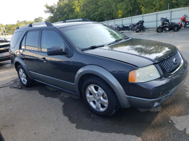 1FMZK02147GA13290 - 2007 FORD FREESTYLE SEL BLACK photo 4