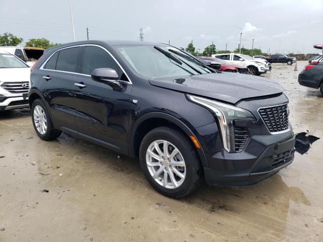 1GYAZAR46NF114685 - 2022 CADILLAC XT4 LUXURY BLACK photo 4