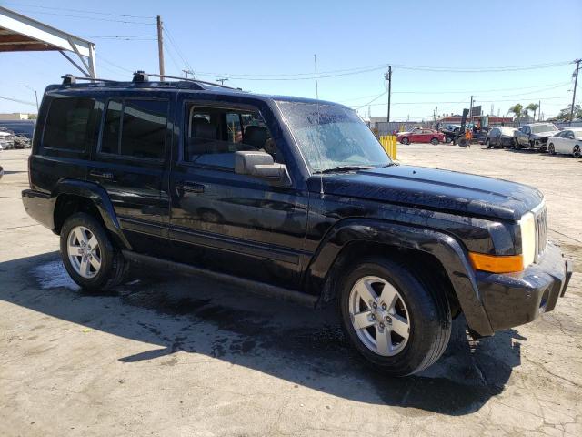 1J8HG48K27C584821 - 2007 JEEP COMMANDER BLACK photo 4