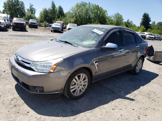 1FAHP37NX9W226886 - 2009 FORD FOCUS SEL GRAY photo 1