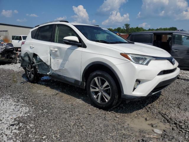 JTMWFREV0GJ087081 - 2016 TOYOTA RAV4 XLE WHITE photo 4