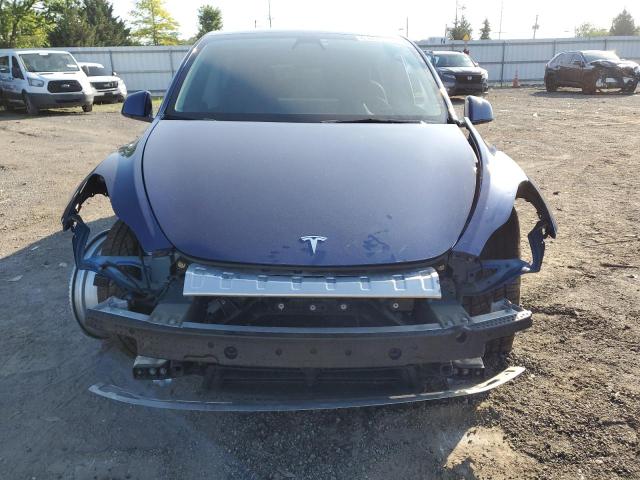 7SAYGDEE4NF327572 - 2022 TESLA MODEL Y ლურჯი ფოტო 5