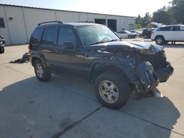 1J4GL58K33W656732 - 2003 JEEP LIBERTY LIMITED BLACK photo 4