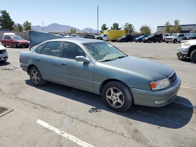 4T1BF18B4XU299722 - 1999 TOYOTA AVALON XL BLUE photo 4