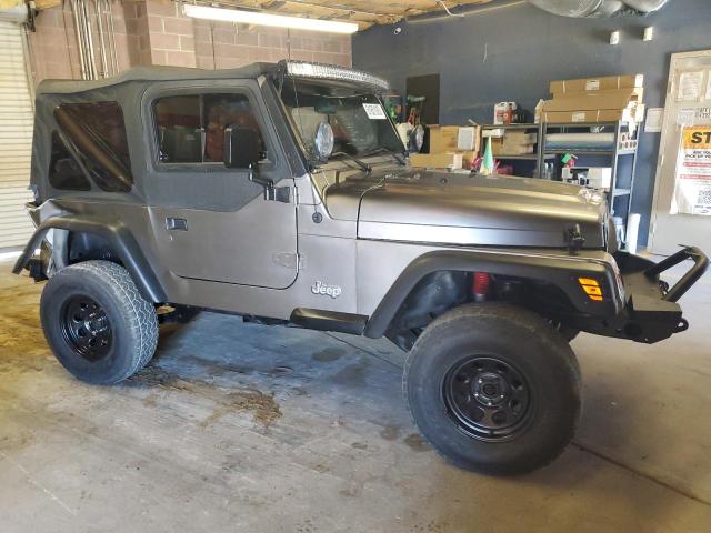 1J4FY29P1WP700604 - 1998 JEEP WRANGLER / SE GRAY photo 4