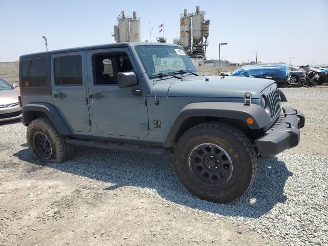 1C4BJWDG1FL712427 - 2015 JEEP WRANGLER U SPORT 灰色 照片 4