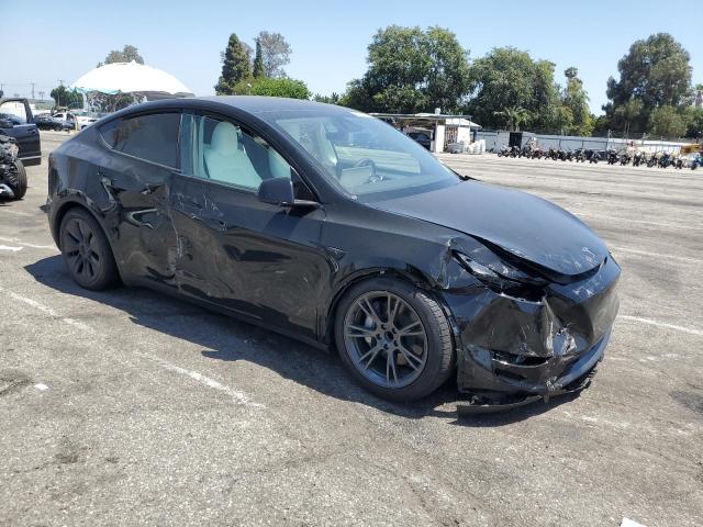 7SAYGDED3SF278416 - 2025 TESLA MODEL Y შავი ფოტო 4