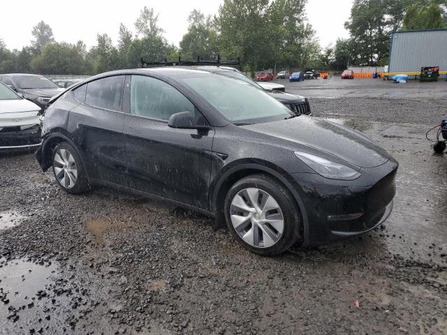 7SAYGAEE7RF987299 - 2024 TESLA MODEL Y Schwarz Foto 4