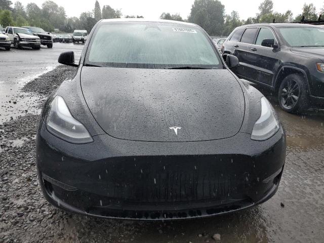 7SAYGAEE7RF987299 - 2024 TESLA MODEL Y Schwarz Foto 5