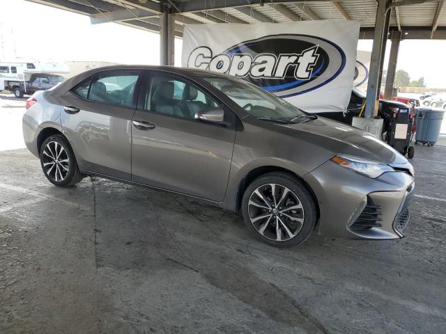 5YFBURHE1KP863545 - 2019 TOYOTA COROLLA L BROWN photo 4