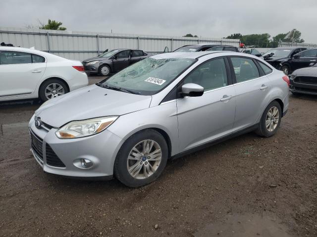 1FAHP3H28CL416828 - 2012 FORD FOCUS SEL SILVER photo 1