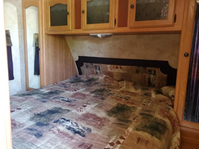 4YDT29022AM411050 - 2010 KEYSTONE PASSPORT WHITE photo 5