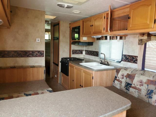 4YDT29022AM411050 - 2010 KEYSTONE PASSPORT WHITE photo 6