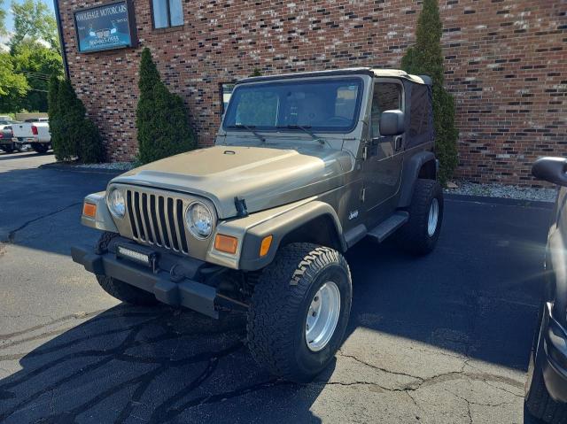 1J4FA49S04P742327 - 2004 JEEP WRANGLER / SPORT GRAY photo 2