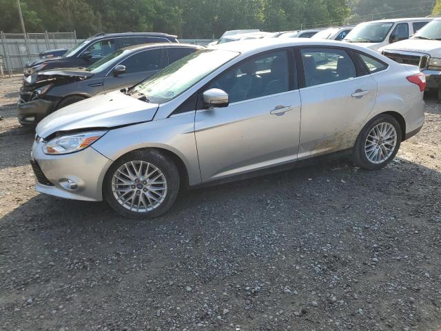 1FAHP3H22CL385561 - 2012 FORD FOCUS SEL SILVER photo 1