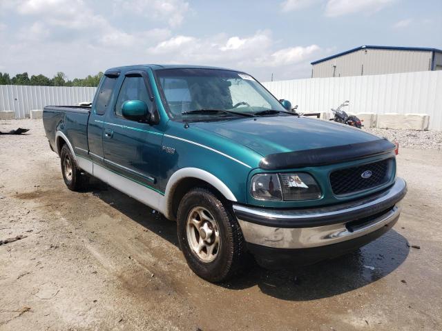 1FTDX1761VND10259 - 1997 FORD F150 GREEN photo 4