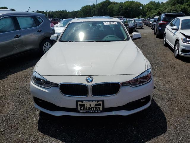 WBA8E5G59JNV02011 - 2018 BMW 320 XI WHITE photo 5