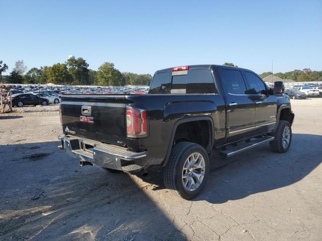 3GTU2NEC8HG323862 - 2017 GMC SIERRA K1500 SLT BLACK photo 4