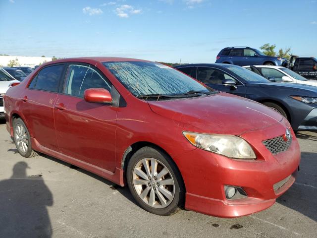 1NXBU4EEXAZ266107 - 2010 TOYOTA COROLLA BASE RED photo 1