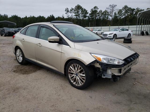 1FADP3J27HL267683 - 2017 FORD FOCUS TITANIUM GOLD photo 1