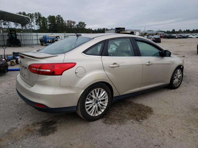 1FADP3J27HL267683 - 2017 FORD FOCUS TITANIUM GOLD photo 4