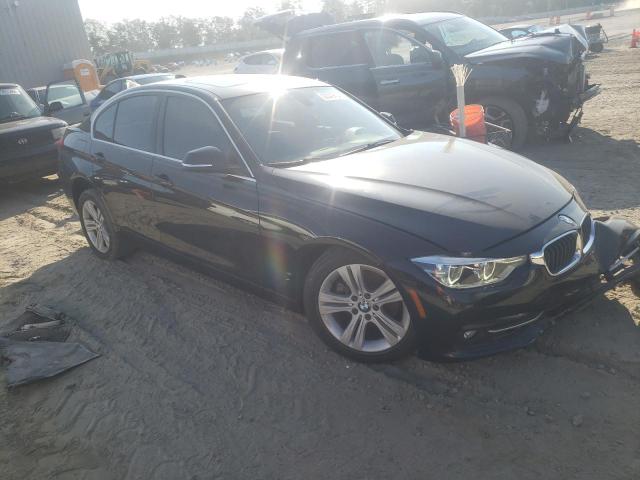 WBA8D9C53JA615704 - 2018 BMW 330 XI BLACK photo 4