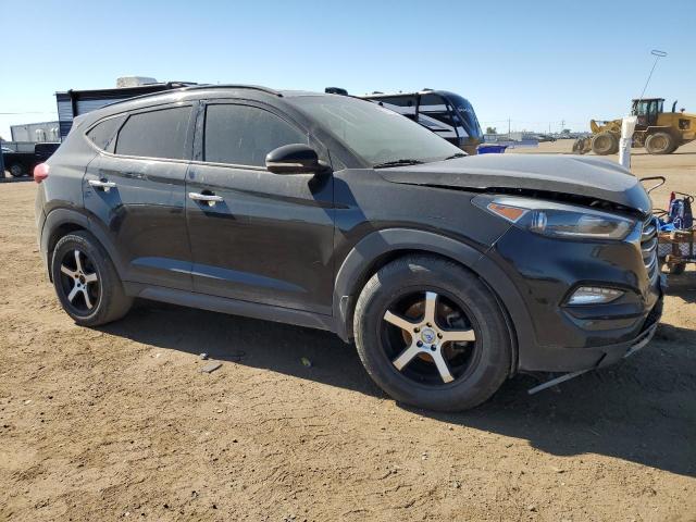 KM8J3CA24GU155971 - 2016 HYUNDAI TUCSON LIMITED BLACK photo 4