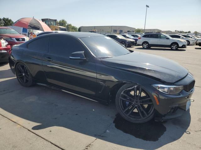 WBA4W7C53KAG53032 - 2019 BMW 440I BLACK photo 4
