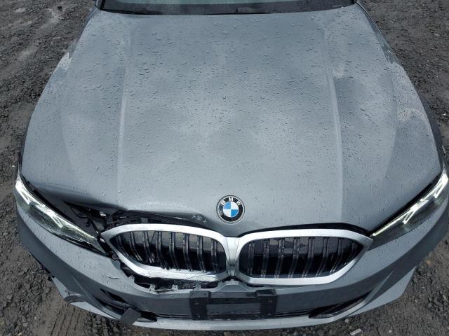 3MW89FF01P8D78408 - 2023 BMW 330XI GRAY photo 11