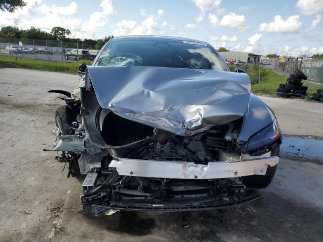 5YJ3E1EA3SF979152 - 2025 TESLA MODEL 3 SILVER photo 5