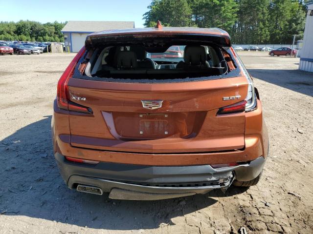 1GYAZAR44KF210715 - 2019 CADILLAC XT4 LUXURY ORANGE photo 6