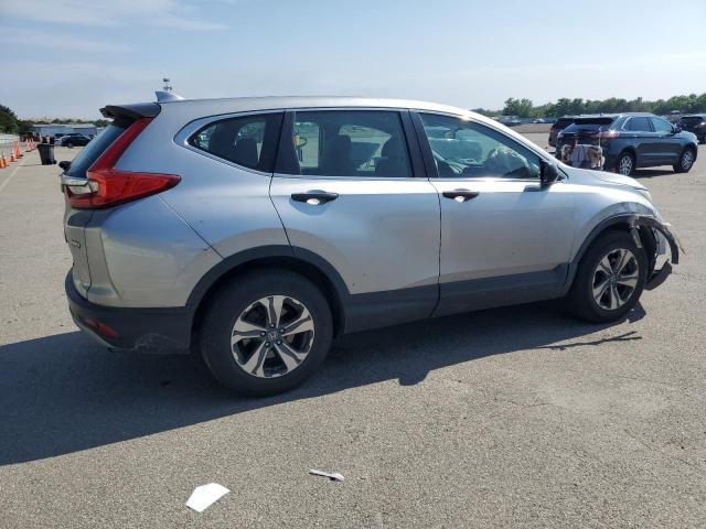 2HKRW6H34JH212699 - 2018 HONDA CR-V LX Silber Foto 3