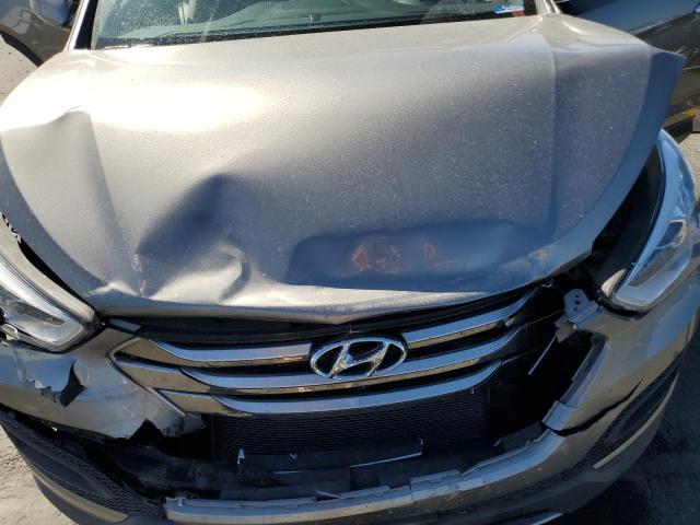 5XYZTDLB5GG362087 - 2016 HYUNDAI SANTA FE S GRAY photo 12