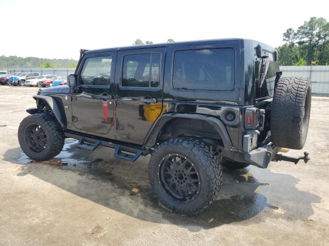 1J4BA3H11AL167868 - 2010 JEEP WRANGLER U SPORT Чорний фото 2