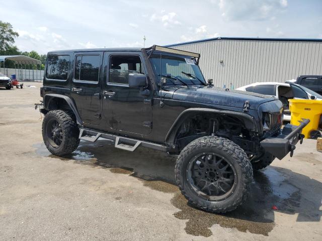 1J4BA3H11AL167868 - 2010 JEEP WRANGLER U SPORT Чорний фото 4