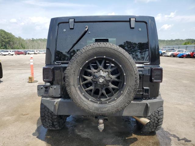1J4BA3H11AL167868 - 2010 JEEP WRANGLER U SPORT Чорний фото 6