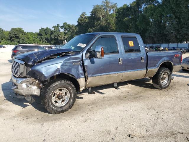 1FTNW21P44EA46869 - 2004 FORD F250 SUPER DUTY BLUE photo 1