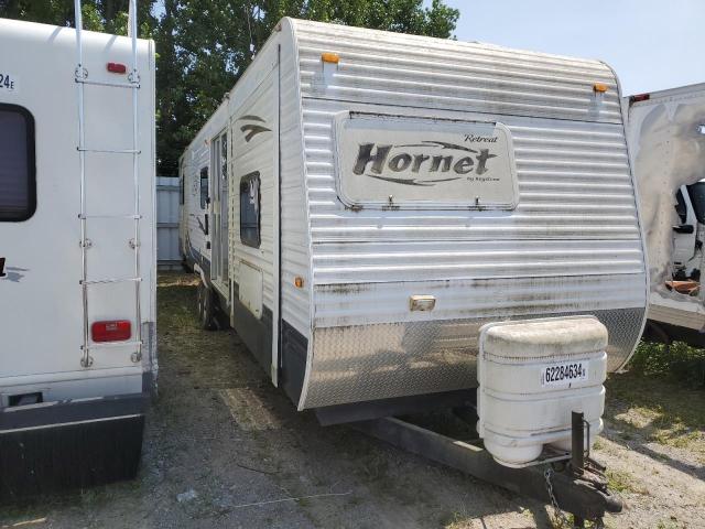 4YDT38K2897201390 - 2009 KEYSTONE HORNET BEIGE photo 1