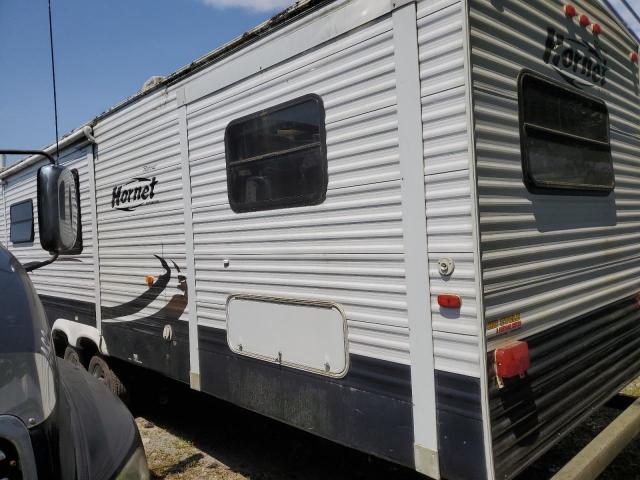 4YDT38K2897201390 - 2009 KEYSTONE HORNET BEIGE photo 3