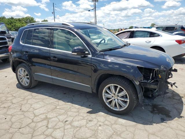 WVGAV7AX2FW537142 - 2015 VOLKSWAGEN TIGUAN S BLACK photo 4